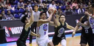 NLEX Road Warriors’ Celedonio Trollano protects the ball while being defended by Terrafirma Dyip’s Javi Gomez de Liano and Negrense John Paul Calvo. PBA PHOTO