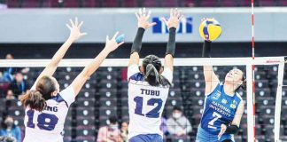 Ilongga Princess Robles of National University Lady Bulldogs scores against two Adamson University Lady Falcons defenders. UAAP PHOTO