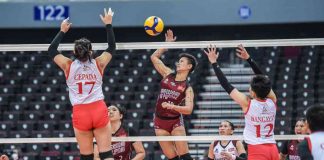 Negrense Alyssa Bertolano of the University of the Philippines Fighting Maroons goes for an attack against a University of the East Red Warriors defender. UAAP PHOTO