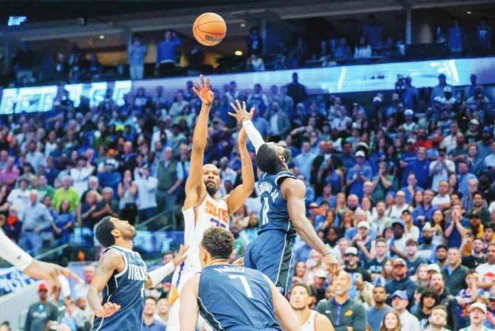 sports durant Phoenix Suns' Kevin Durant with his go-ahead jumper against the defense of Dallas Mavericks' Tim Hardaway Jr. and Kyrie Irving. PHOTO BY GARETH PATTERSON/AP