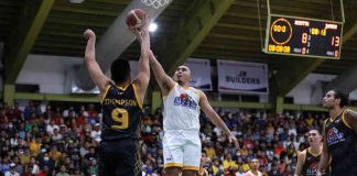 Paul Lee of Team Japeth soars for a layup against the defense of Earl Scottie Thompson of Team Scottie during the 2023 PBA All-Star Weekend last night at the City of Passi Arena in Passi City, Iloilo. PBA PHOTO