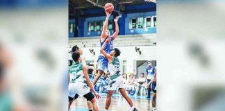 Bacolod Tay Tung High School Thunderbolts’ Dave Matthew Recodo goes for a one-hander against a University of St. La Salle defender. PHOTO COURTESY OF ALAN SU