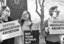 Wyoming becomes first US state to ban abortion pills Protesters in Texas hold signs reading “defend medical abortion”. GETTY IMAGES