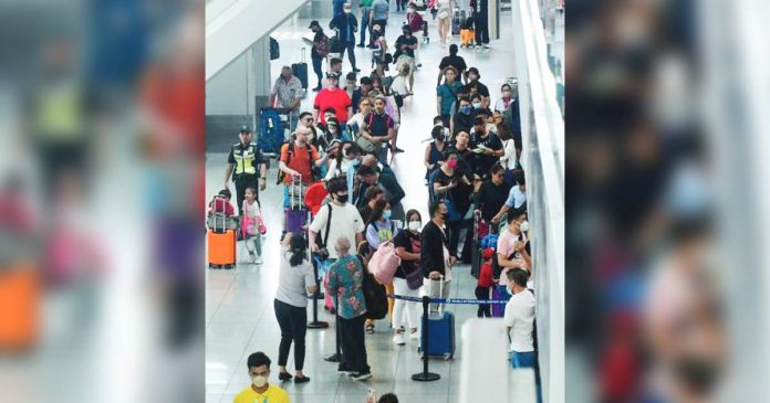 New Project Passengers arrive at the Ninoy Aquino International Terminal 3 in Pasay City on April 5, 2023. The country aims to attract nearly 5 million foreign visitors this year. MARK DEMAYO/ABS-CBN NEWS PHOTO