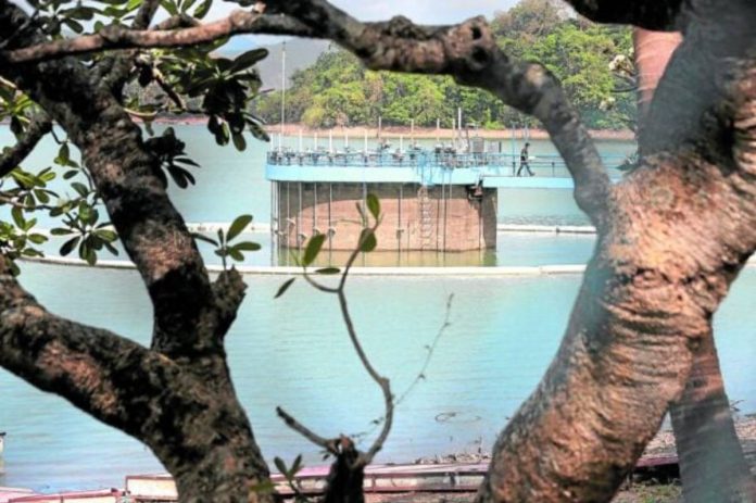 nation DOH PRECIOUS SOURCE. Water elevation at La Mesa Dam in Quezon City drops to 76.49 meters March 28, 2023 as concessionaires advise consumers to conserve water during the dry season and to brace for possible supply interruptions. GRIG C. MONTEGRANDET, PHILIPPINE DAILY INQUIRER