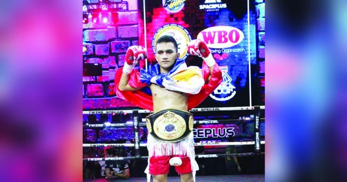 sports negrense_superimposed John Michael Zulueta of Calatrava, Negros Occidental is the Asian Boxing Federation’s light flyweight champion. CONTRIBUTED PHOTO