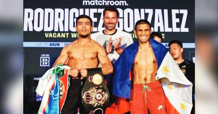 tapales Filipino boxer Marlon Tapales (right) emerges victorious with the WBA and IBF super bantamweight belts after a split decision win over Murodjon Akhmadaliev. SANMAN PROMOTIONS PHOTO