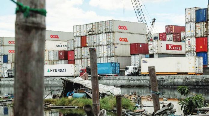 trade deficit The Philippines’ annual total export sales from January to February 2023 reached $10.33 billion. Photo shows a man resting inside a floating house near a container port warehouse in Navotas, Manila. JONATHAN CELLONA, ABS-CBN NEWS/FILE PHOTO