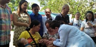 A medical officer administers oral polio vaccine to one of the target children during a door-to-door supplemental immunization of the Department of Health Region 6 in this file photo. PHOTO COURTESY OF PNA