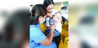 Personnel of the Aklan Provincial Health Office conducting the ‘Chikiting Ligtas’ measles-rubella (left) and oral polio vaccination (right) activity in Barangay Poblacion, Madalag, Aklan. As of Wednesday, May 3, nearly 2,000 children received their doses. AKLAN PROVINCIAL HEALTH OFFICE FACEBOOK
