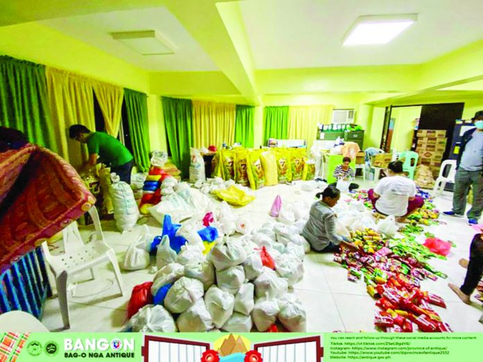 Antique_resized The Social Welfare Department and the Disaster Risk Reduction and Management offices of Antique ready family food packs in preparation for the possible effects of Super Typhoon “Mawar”. PROVINCE OF ANTIQUE FACEBOOK PAGE