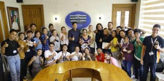 The Capiz State University Main Chorale together with Roxas City's Mayor Ronnie Dadivas. The group will compete in the 12th World Choir Games in South Korea in July.