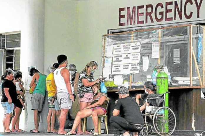 COVID_resized Patients outside the emergency room of the Andres Bonifacio Memorial Medical Center in Manila. File photo by RICHARD A. REYES / Philippine Daily Inquirer