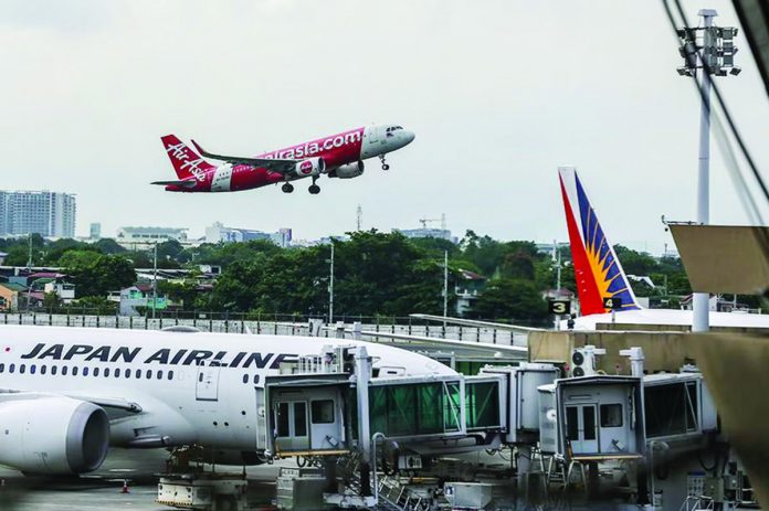 Lower_airfares.JPG_resized Flights take off at the Ninoy Aquino International Airport (NAIA) Terminal 1 after the momentary shutdown of the Philippine airspace due to maintenance work on Wednesday, May 17. JONATHAN CELLONA/ABS-CBN NEWS PHOTO