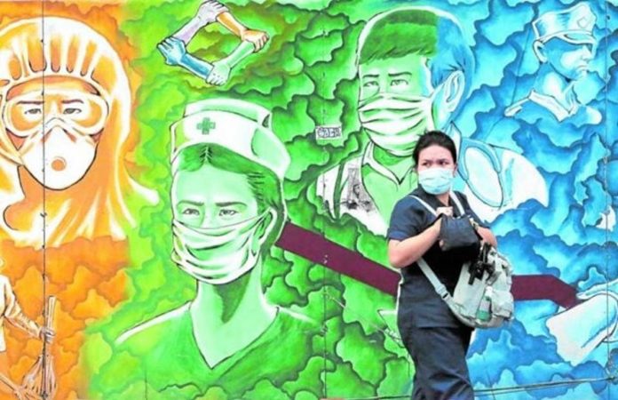 covid_resized PROTECTION. In Pasig City, pandemic-themed murals remind residents about the importance of wearing facemasks in the fight against COVID-19. Health officials say the continued and proper wearing of masks is among the most effective ways to fight the virus. FILE PHOTO BY GRIG C. MONTEGRANDE / PHILIPPINE DAILY INQUIRER