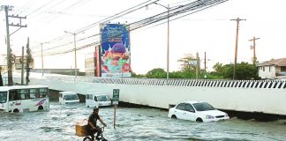 Continuous rains since Wednesday, May 3, until Friday, May 5, caused flooding in this road beneath the Ungka flyover in Barangay Ungka II, Pavia, Iloilo. AJ PALCULLO/PN