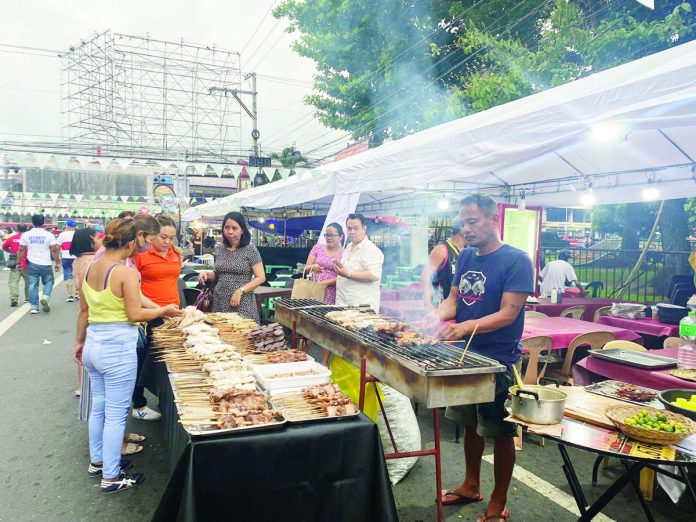 inasal_fest_resized Bacolod City’s Chicken Inasal Festival featured rows of grilling stations cooking various chicken parts. The three-day celebration was generally peaceful, according to the city police. BCD PIO FACEBOOK
