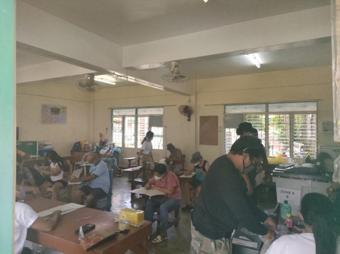 manual_election_resized Voters cast their ballots at a polling precinct in this file photo. Antique is not included in the pilot areas for the automated election during the Barangay and Sangguniang Kabataan Election on Oct. 30. PN FILE PHOTO