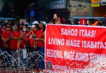 Members of local labor alliances in Marikina City gather at the city's clocktower on Labor Day, May 1, 2023. Multisectoral groups called for living wages, decent working conditions, right to union and freedom of association for Filipino workers, alongside calling out the Marcos Jr. administration for alleged band-aid solutions to labor issues and running from it via a state visit to the United States. MARK DEMAYO/ABS-CBN NEWS PHOTO
