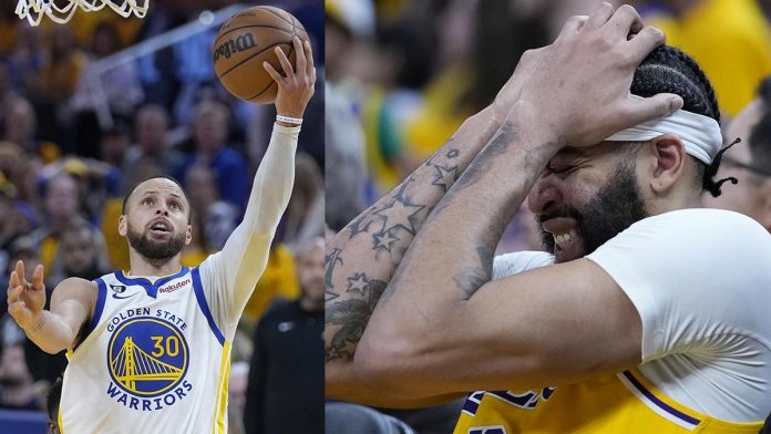 sports NBA pic and caption The Golden State Warriors’ Stephen Curry (left) rallies teammates to win against the Los Angeles Lakers whose Anthony Davis (right) had to go to the locker room late after appearing to take a hit in the head. AP
