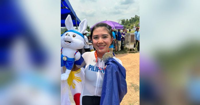 sports ilongga_superimposed Ilongga rider Ariana Evangelista is all smiles after receiving her silver medal in the 32nd Southeast Asian Games. PHOTO COURTESY OF PSC