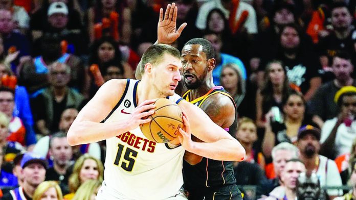 sports_NBA_resized Nikola Jokic of the Denver Nuggets takes control of the ball. The Nuggets advances to the Western Conference finals of the NBA for the first time since 2020. AP
