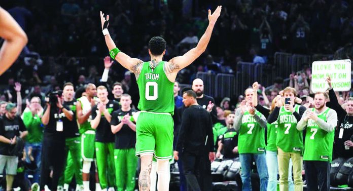 sports_NBA_resized “It’s the best time of the year,” says Boston Celtics’ Jayson Tatum said. “As a competitor, I love the opportunity.” He is shown here celebrating after the Celtics won Game 7 against the Philadelphia 76ers. AP
