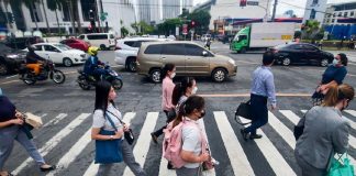 The quality of jobs in the Philippines has improved as seen in the reduction of underemployment in March this year. Photo shows office workers walking at a crossing in Makati City. MARK DEMAYO/ABS-CBN NEWS FILE PHOTO