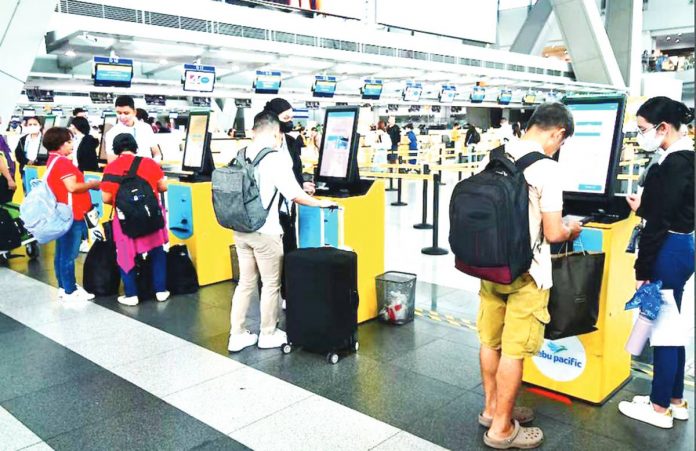 NAIA rehab Domestic flight passengers check in at Cebu Pacific's on-site check-in lane at the Ninoy Aquino International Airport Terminal 3 in Pasay City. MARK DEMAYO/ABS-CBN NEWS PHOTO