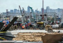 Workers are seen at the North Luzon Expressway connector project, Caloocan to España, in February this year. JONATHAN CELLONA/ABS-CBN NEWS PHOTO