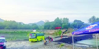 A new temporary access road was built at the Paliwan River after the first one washed away last week. The road was built in lieu of the Paliwan Bridge, which collapsed last year. VERLIN DUNGGANON RUBIDO PHOTO