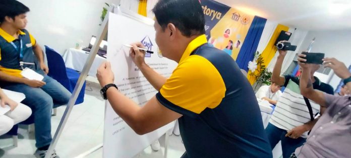 Roxas City Roxas City government officials, headed by Mayor Ronnie Dadivas and stakeholders, sign a commitment to support the mental health program dubbed "KaEstorya Multi-platform Mental Health Support Line." MERLINDA BAGNATE PHOTO