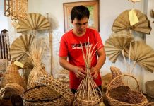 Policy to make gov’t agencies ‘buy local’ sought Jessie Arenas arrange furniture made of various indigenous materials inside a shop in Villaba, Leyte. BASILIO SEPE / OXFAM PILIPINAS PHOTO