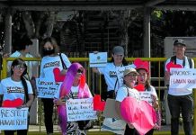 This photo taken on Feb. 14, 2023 shows pro-divorce protesters taking part in a demonstration on Valentine’s Day in front of the Senate Building in Pasay, Metro Manila. AFP