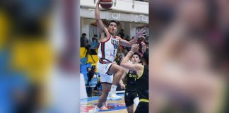 Iloilo United Royals-Cocolife’s Tony Ynot attacks a Bacoor City Strikers’ defender for a layup. MPBL PHOTO
