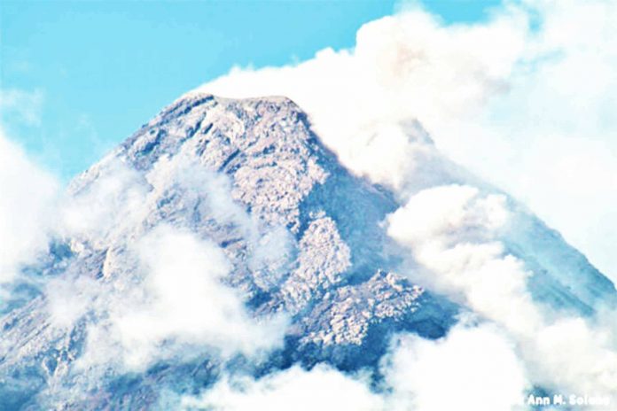 mayon Smoke billows from Mayon Volcano as seen from Camalig, Albay. Alert Level 3 has been raised over Mayon Volcano, which means that it is currently in a relatively high level of unrest. Magma is at the crater and hazardous eruption is possible within weeks or even days. CONTRIBUTED PHOTO/Alyssa Ann M. Solano, Philippine Daily Inquirer
