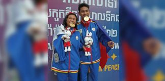 Negrense Ariel Joseph Alegarbes is pictured with fellow Team Philippines para swimmer Angel Otom who captured a gold in women’s 200-meter individual medley SM5. PSC PHOTO POOL