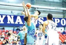 NLEX wallops Phoenix for 1st win in PBA on Tour Ilonggo Clint Doliguez of the NLEX Road Warriors wards the defense of Antiqueño Tzaddy Rangel of Phoenix Super LPG Fuel Masters for a layup attempt. PBA PHOTO