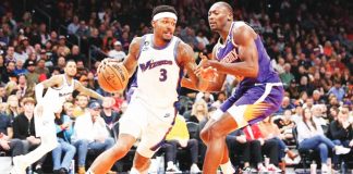 Bradley Beal and Bismack Biyombo are now teammates at the Phoenix Suns after the former was shipped out by Washington Wizards. GETTY IMAGES