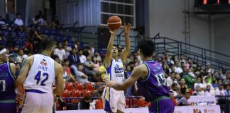 Magnolia Chicken Timplados Hotshots’ Andy Mark Barroca pulls up for a three-point attempt. PBA PHOTO