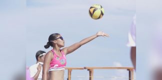 Negrense Honey Grace Cordero of Grass to Bone team prepares to serve during their 2023 BVR on Tour Sipalay City leg game. BVR PHOTO