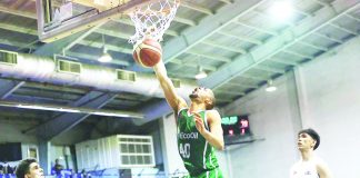 EcoOil-La Salle Green Archers’ Michael Phillips scores on a one-handed dunk during their Game 1 win over Marinerong Pilipino-San Beda Red Lions in the 2023 PBA D-League Aspirants Cup Finals. PBA PHOTO