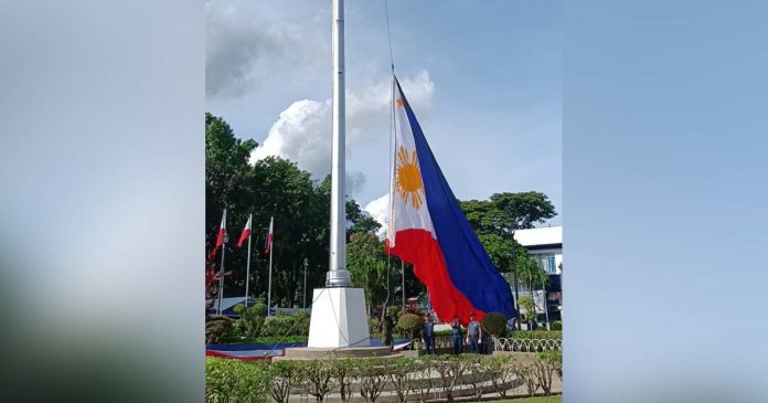 sta-barbara A giant Philippine national flag was raised at the historic public plaza of Santa Barbara, Iloilo during the province’s celebration of the 125th Independence Day on Monday, June 12, 2023. AJ PALCULLO/PN