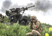 Kyiv liberates three villages from Russia Ukrainian troops fire an artillery cannon in Donetsk. REUTERS