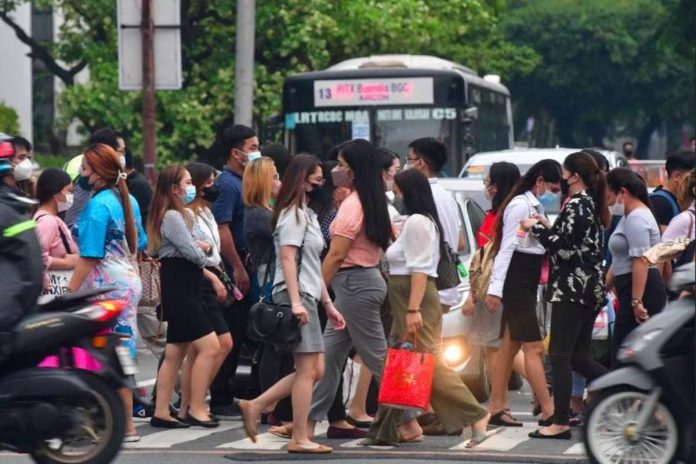 unemployed pinoys Pedestrians walk at a crossing in Makati City. The number of unemployed persons aged 15 years old and above declined to 2.26 million in April 2023, according to the Philippine Statistics Authority. MARK DEMAYO/ABS-CBN NEWS PHOTO