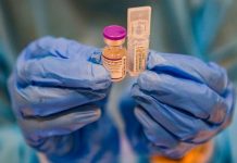 Iloilo set to receive 2,430 doses of COVID-19 bivalent vaccines A health worker holds a vial of Pfizer's COVID-19 vaccine. Iloilo province will receive today 2,430 doses of Pfizer bivalent vaccine against COVID-19. GEORGE CALVELO/ABS-CBN NEWS/FILE PHOTO
