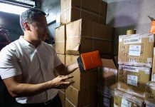 BIR cracks down again vs illicit cigarette and alcohol trade Bureau of Internal Revenue (BIR) commissioner Romeo Lumagui Jr. says the bureau recently confiscated several bottles of alcohol and boxes of cigarettes with no excise tax stamp in Makati City. Photo shows then-BIR deputy commissioner Lumagui in a raid of a warehouse of alleged illegal vapes in Tondo, Manila in 2022. THE STAR/JESSE BUSTOS PHOTO