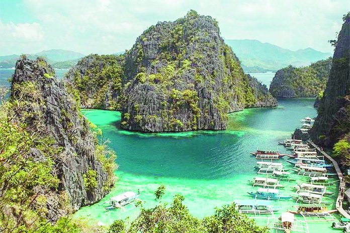 PH_destinations_resized Palawan is nominated as the Most Desirable Island for 2023 Wanderlust Reader Travel Awards. Photo shows one of the many limestone cliffs of Palawan. IMAGE BY GIULIANO GABELLA VIA UNSPLASH