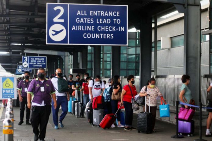 airport_resized Passengers arrive at the Ninoy Aquino International Airport (NAIA) Terminal 3. INQUIRER FILE PHOTO