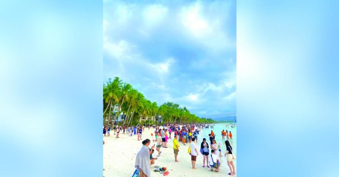 boracay_superimposed Tourists flock at the Boracay Island in January 2023. PHOTO COURTESY OF MALAY-BORACAY TOURISM OFFICE